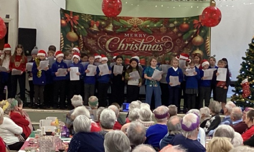Bradwell Junior School students performing at the Bradda Dad's Pensioners' Lunch.