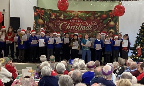 Bradwell Junior School students performing at the Bradda Dad's Pensioners' Lunch.
